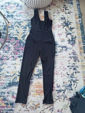 Trac Black Sleeveless Corset-Front Jumpsuit